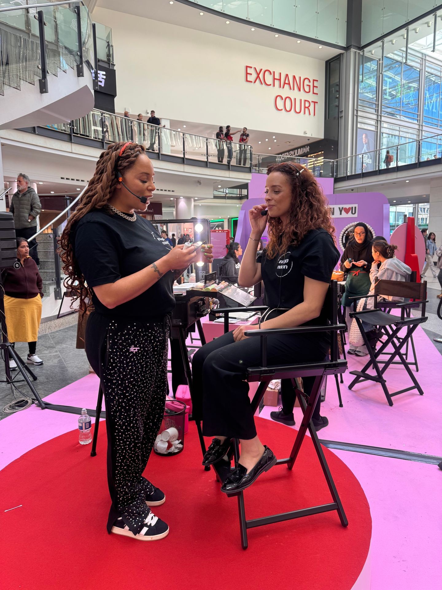 Live makeup demonstration on stage Live makeup demonstration on stage